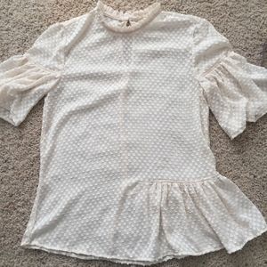 Swiss dot peplum top